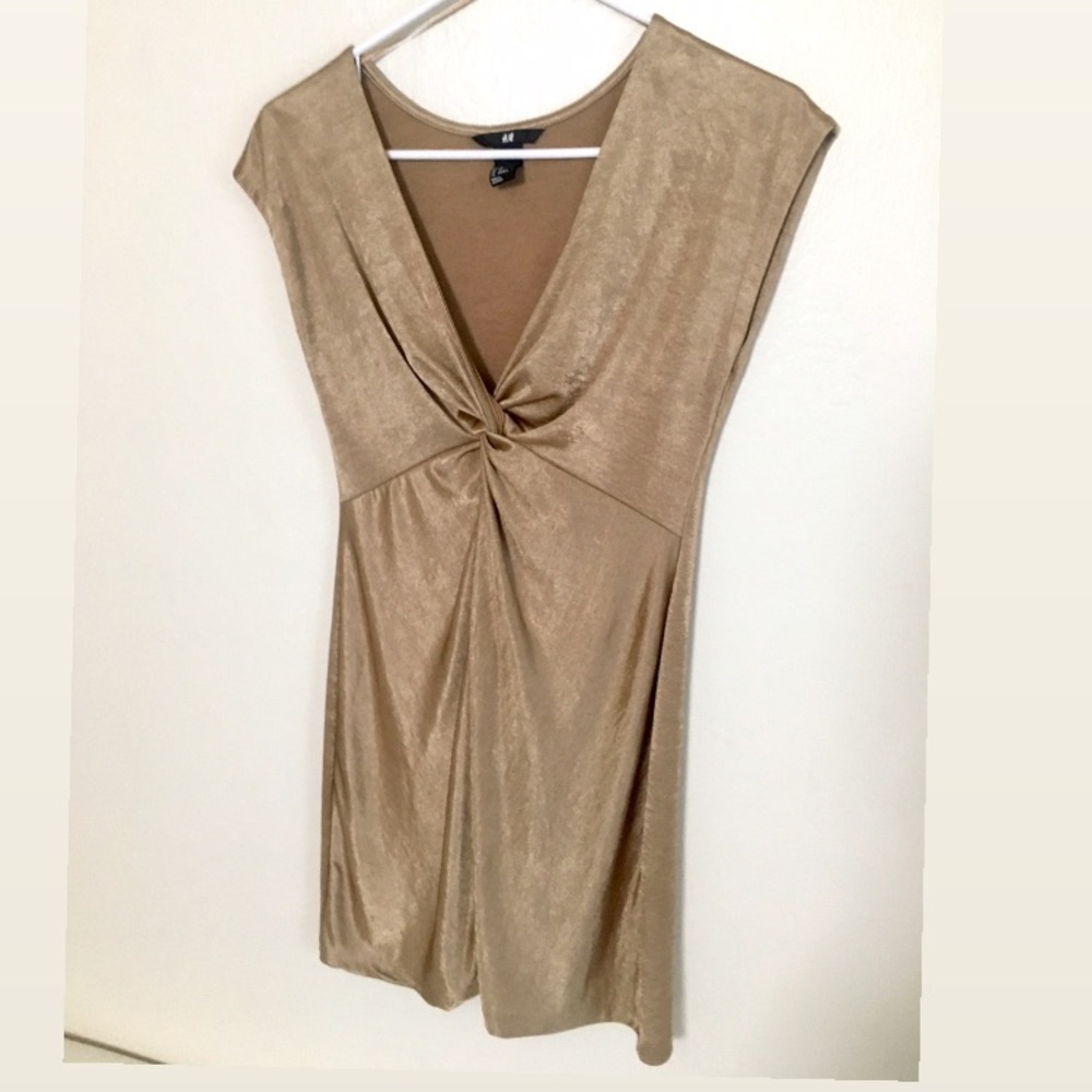 Gold one piece dress. Business formal.